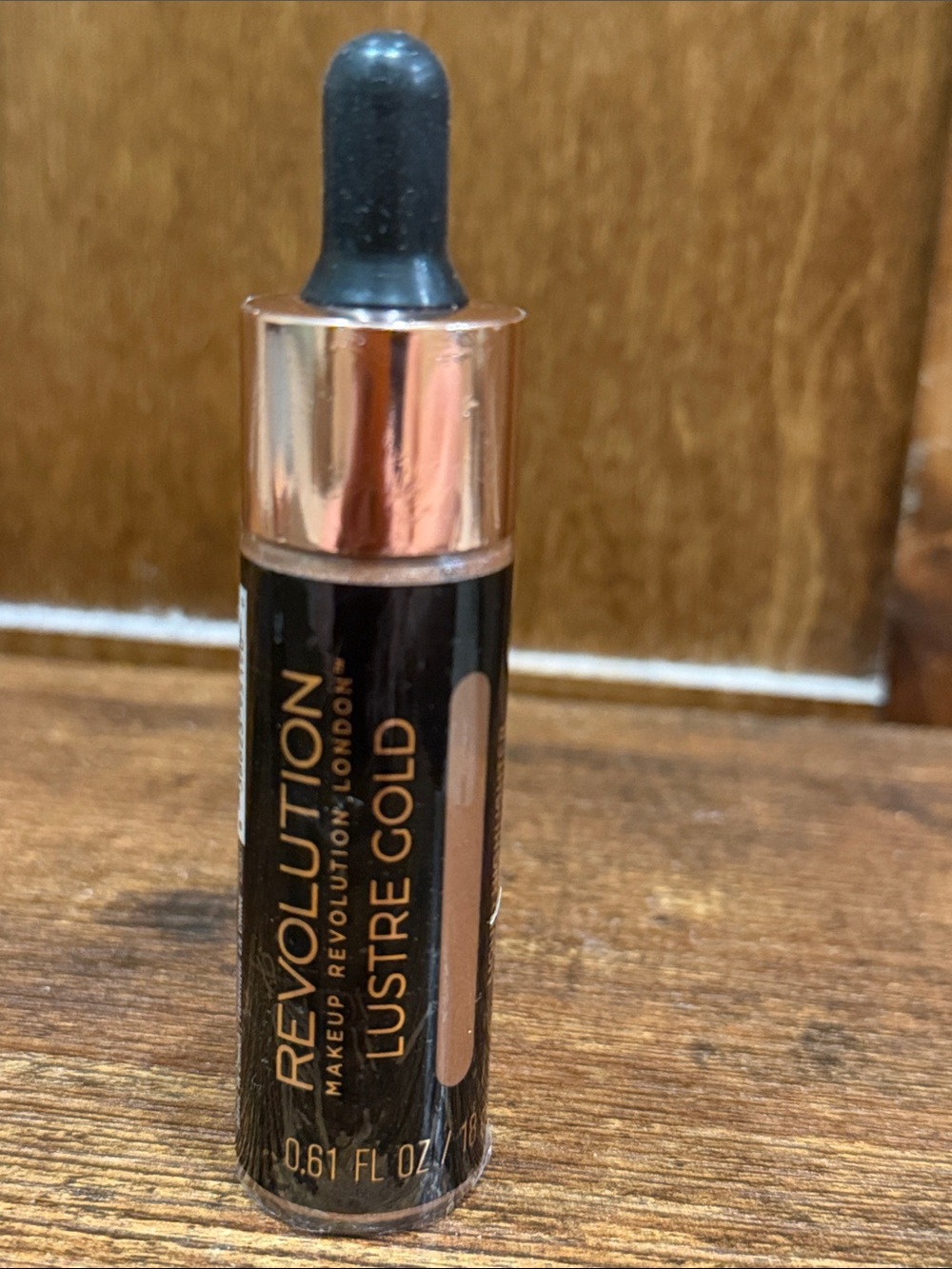 Revolution Lustre Gold Liquid Highlighter - Rose Gold Cap
